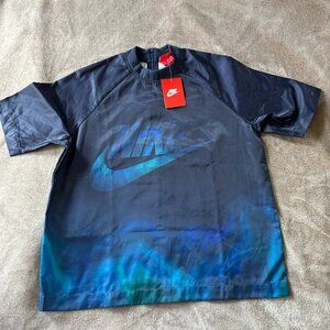 Nike Women's Short Sleeve Swim/Surf Shirt with back zipper Blue turquoise size M